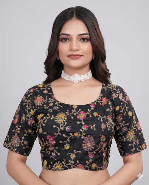 Black embroidered saree blouse back view with keyhole and tassel tie