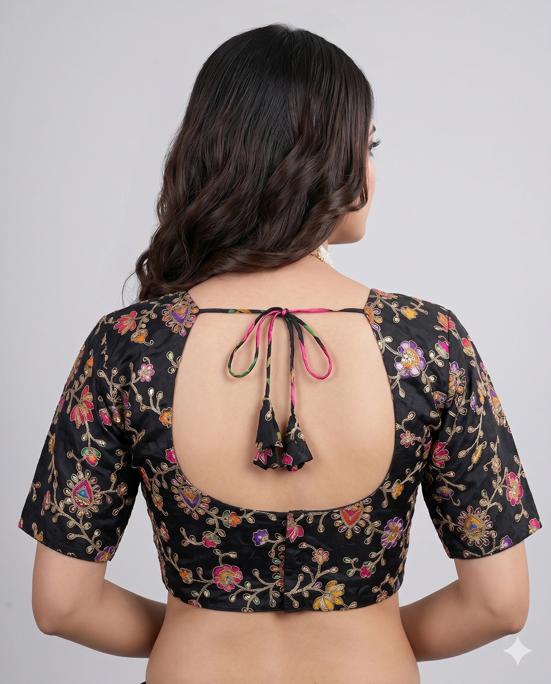 Black embroidered saree blouse back view with open keyhole design