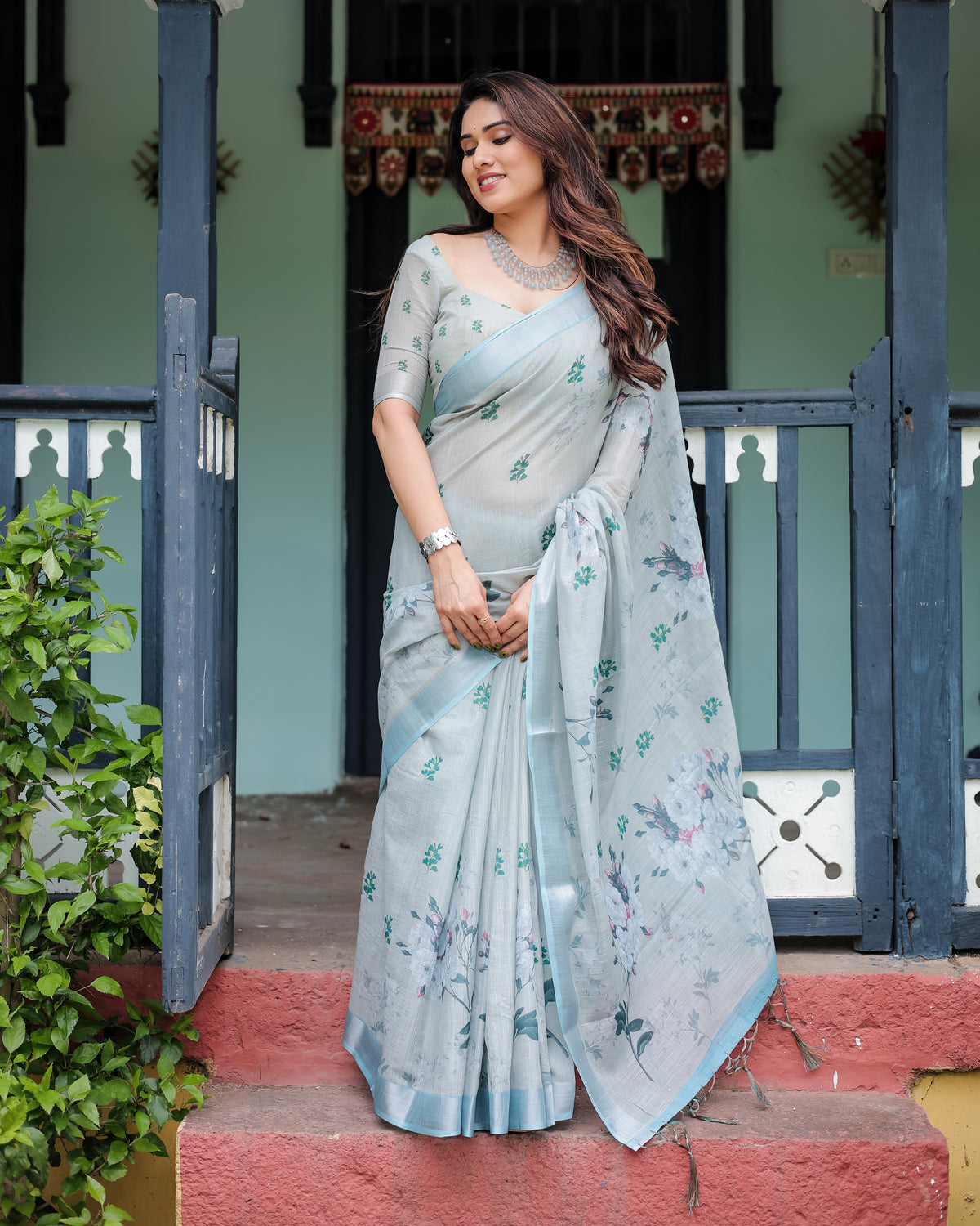 Powder Blue Floral Linen Saree with Silver Zari Border