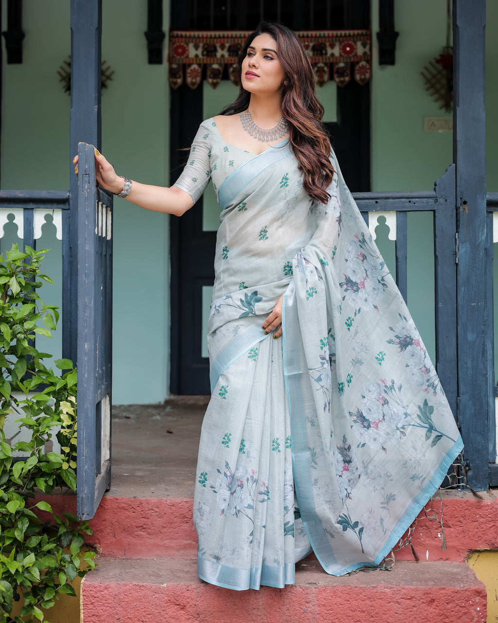 Powder Blue Floral Linen Saree with Silver Zari Border