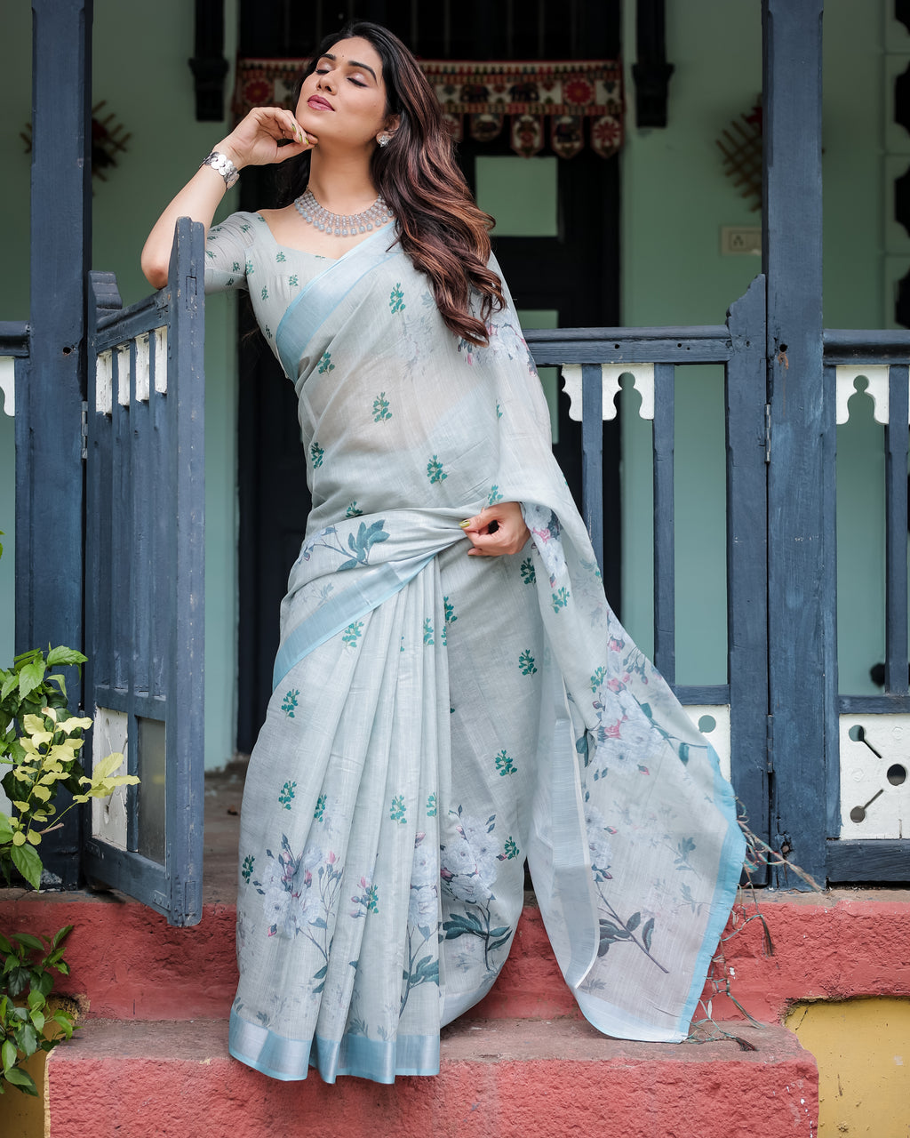 Powder Blue Floral Linen Saree with Silver Zari Border