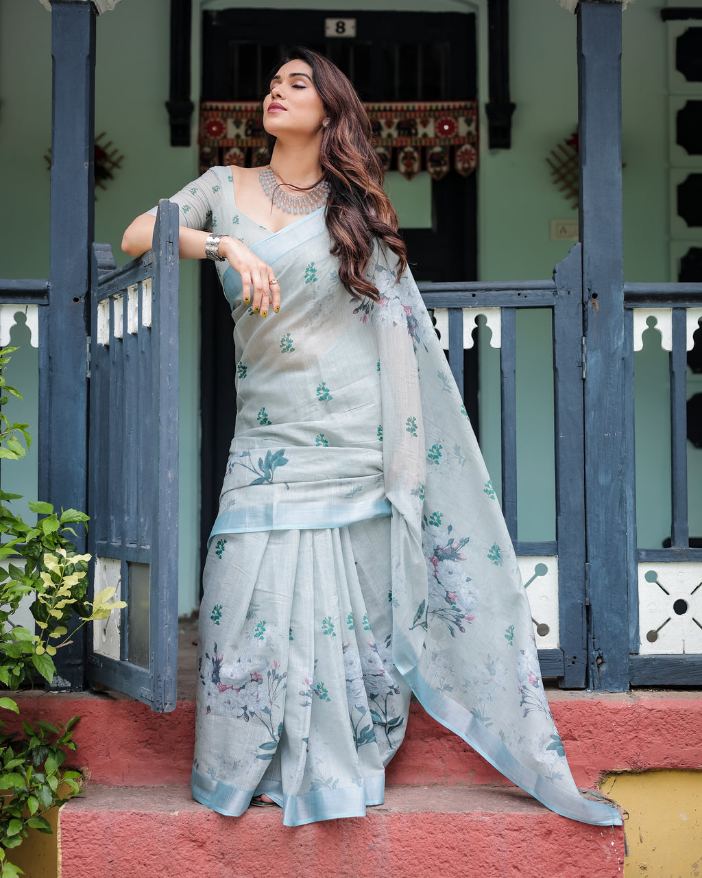 Powder Blue Floral Linen Saree with Silver Zari Border