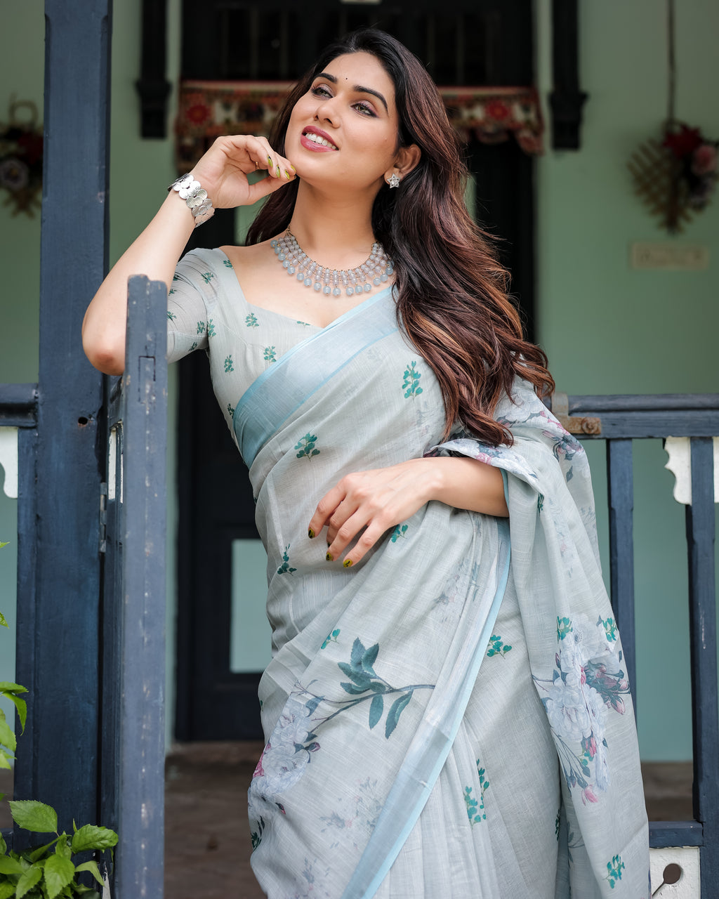 Powder Blue Floral Linen Saree with Silver Zari Border