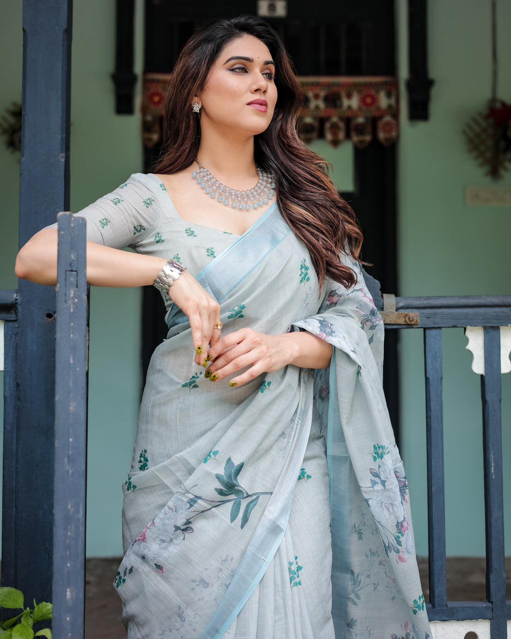Powder Blue Floral Linen Saree with Silver Zari Border