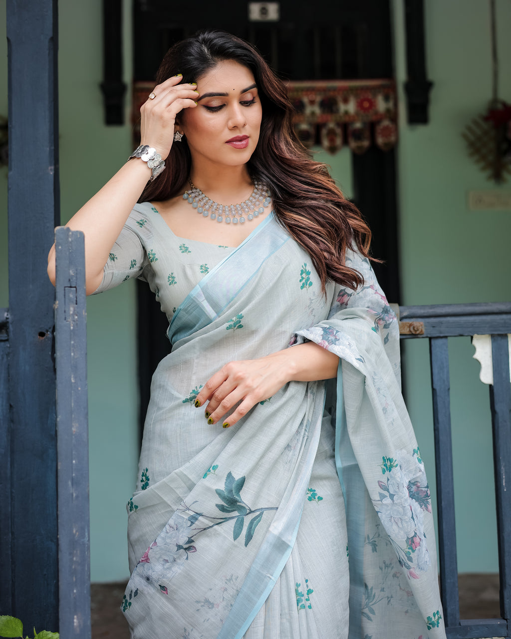 Powder Blue Floral Linen Saree with Silver Zari Border