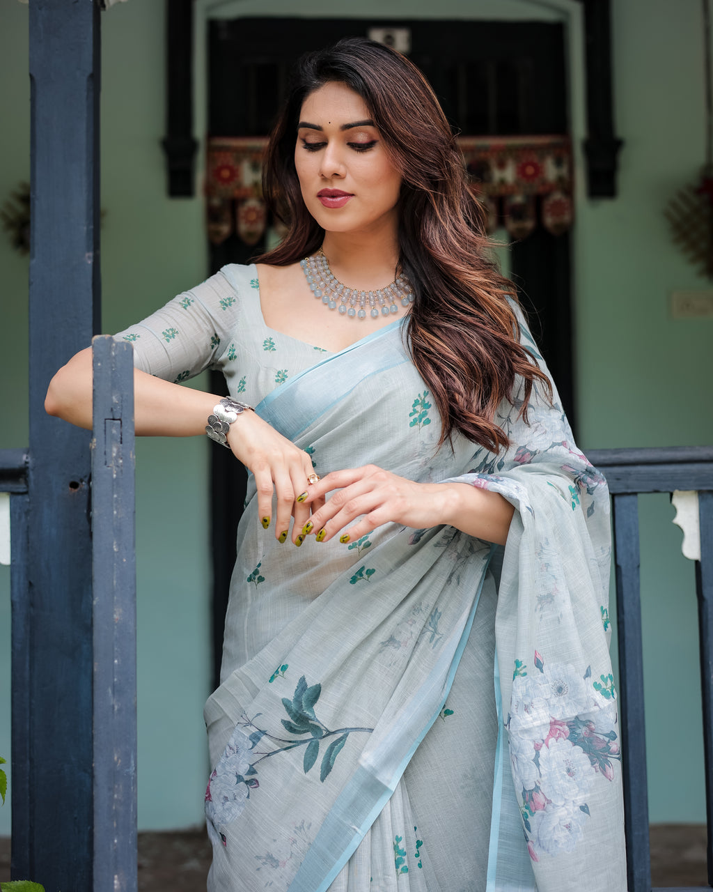 Powder Blue Floral Linen Saree with Silver Zari Border