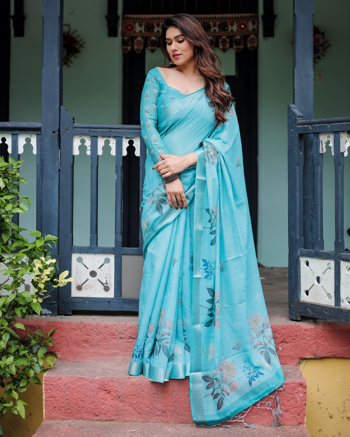 Sky Blue Floral Linen Silk Saree with Tassel Border