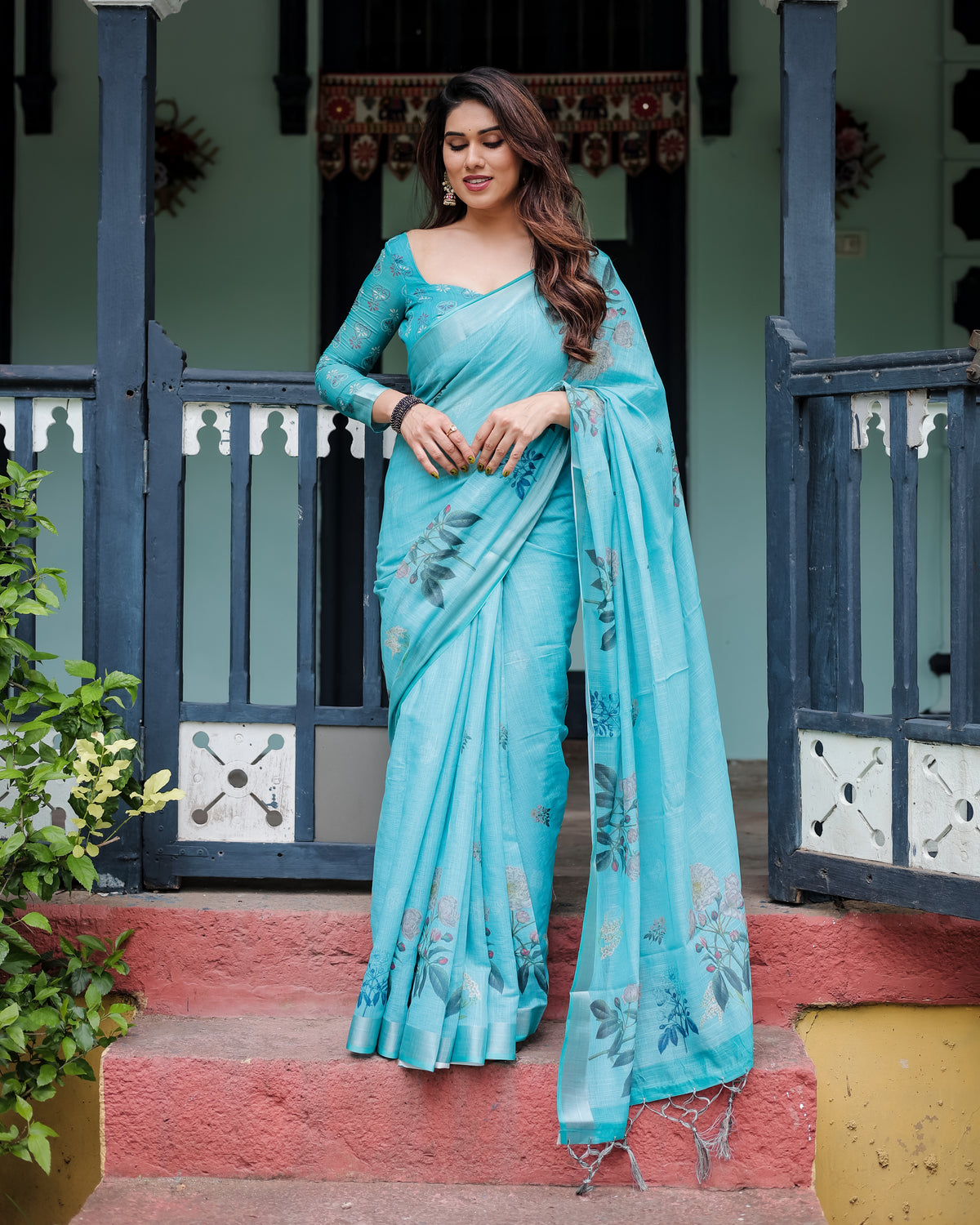 Sky Blue Floral Linen Silk Saree with Tassel Border