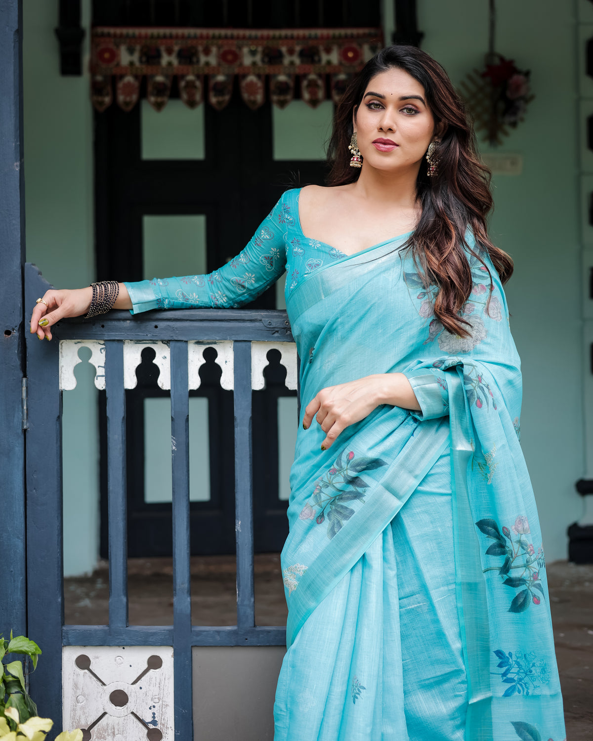 Sky Blue Floral Linen Silk Saree with Tassel Border