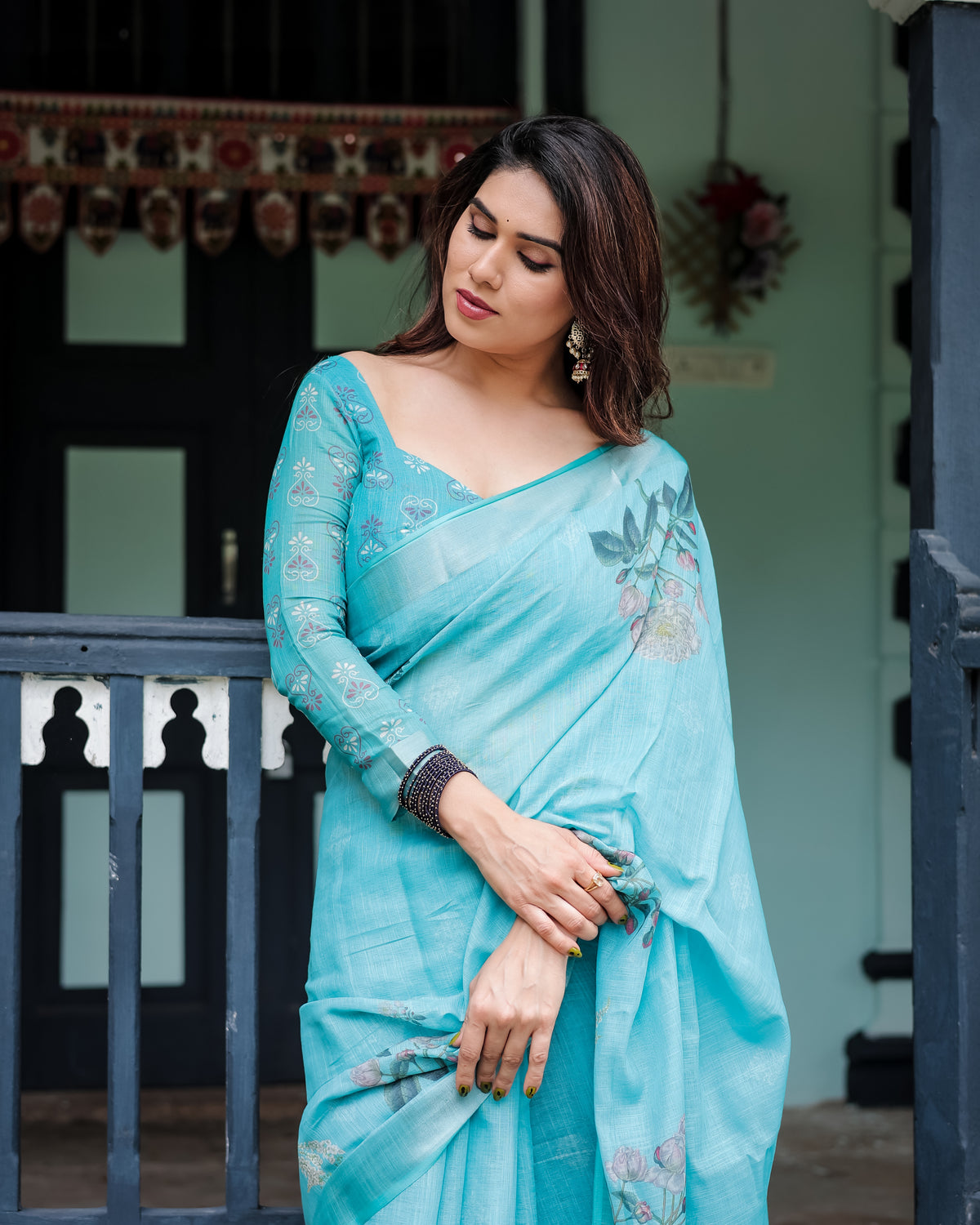 Sky Blue Floral Linen Silk Saree with Tassel Border