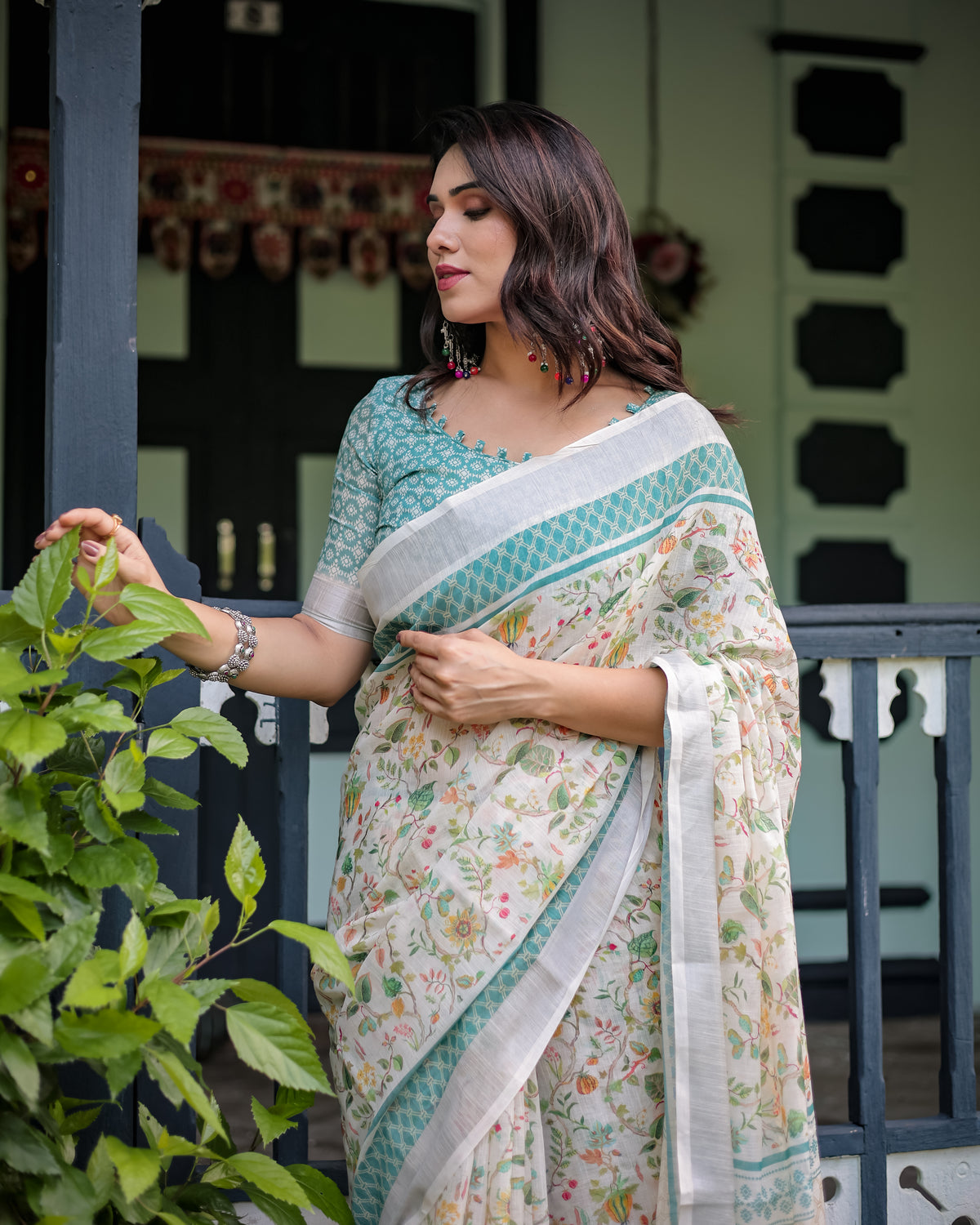 Ivory Floral Printed Saree with Sage Green Border