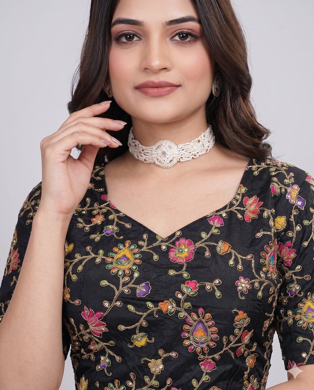 Black embroidered saree blouse detail view
